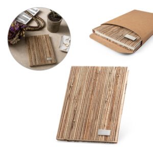 Caderno A5 de capa dura em palha natural com páginas pautadas recicladas